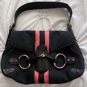 Vintage Y2K Gucci Abbey Horsebit bag in black GG canvas with signature stripe.